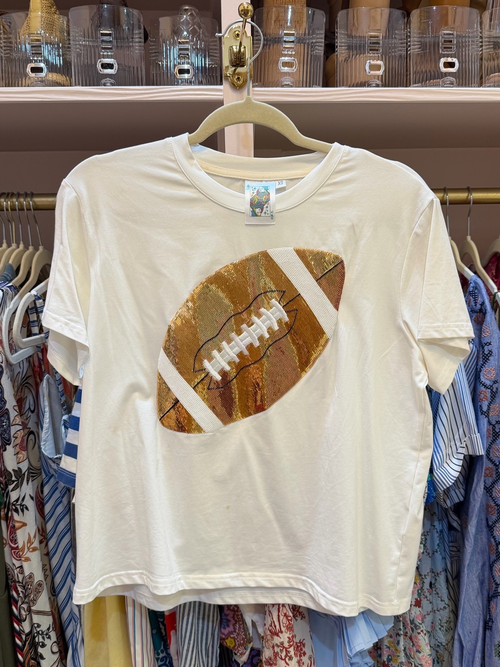 Women’s small queen of sparkles football tee